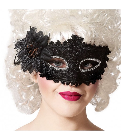 Maschera veneziana nera con fiore per completare il costume